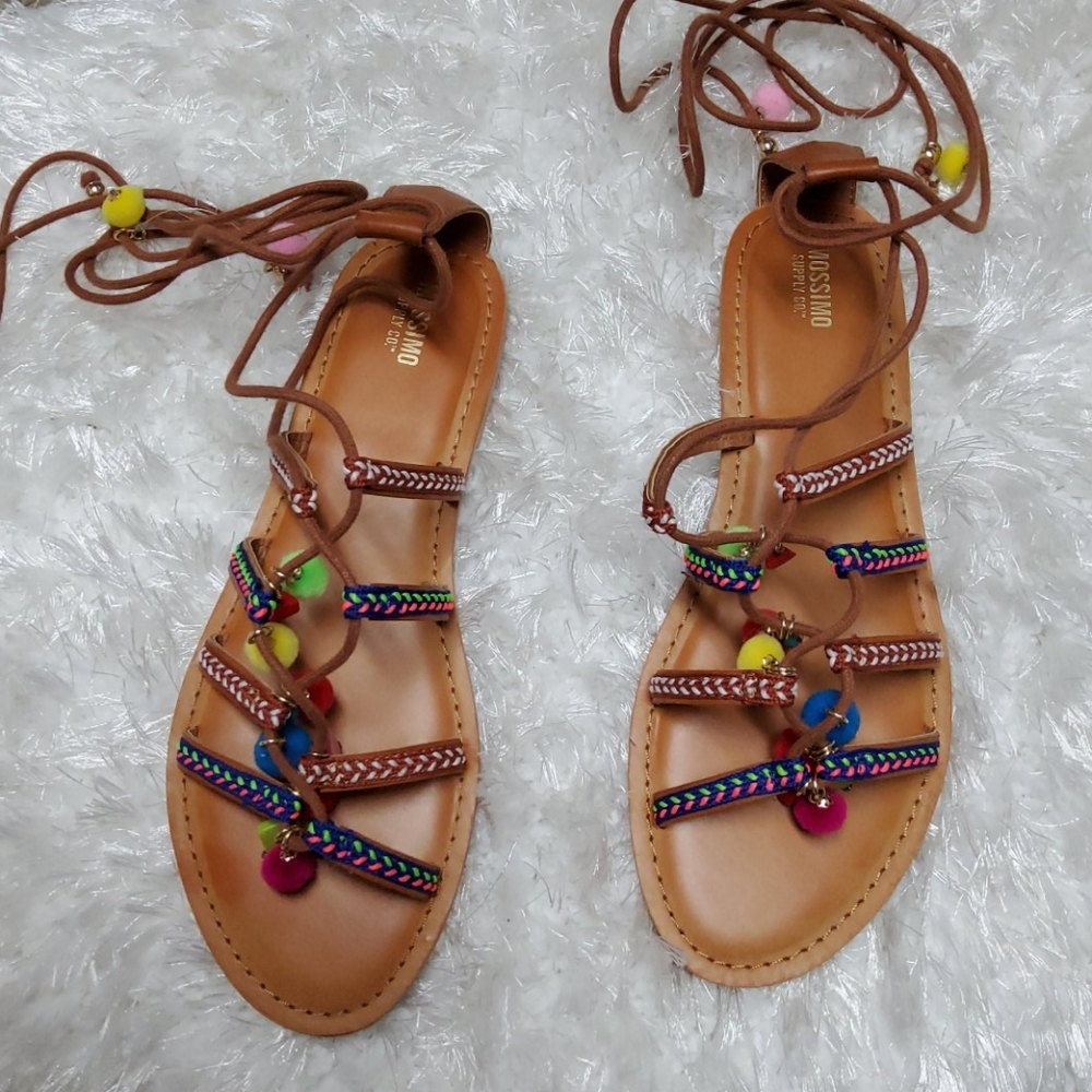 Massimo ankle wrap sandals with poms.  Size 8.5